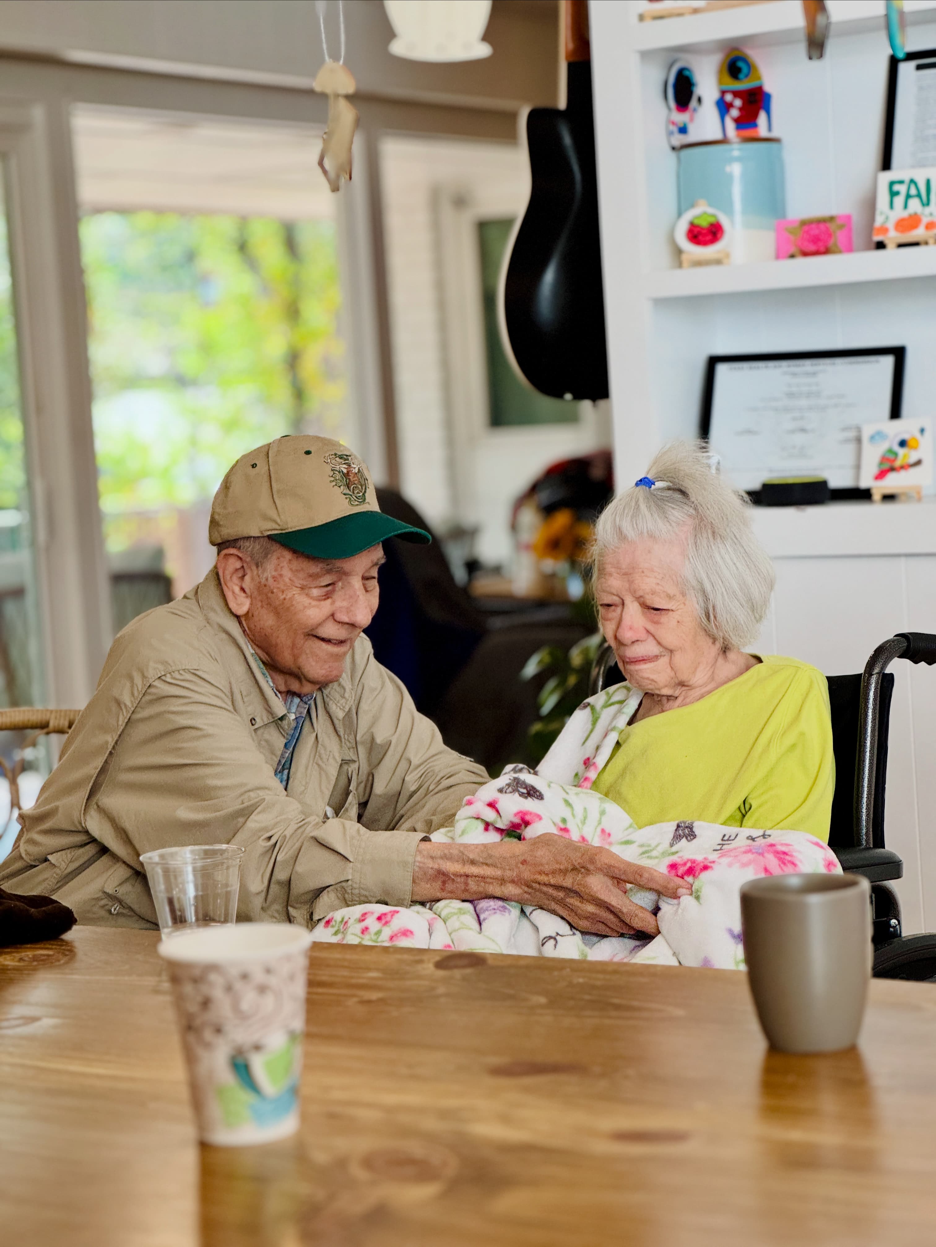 A caregiver lovingly tending to a resident at Timeless Care Homes